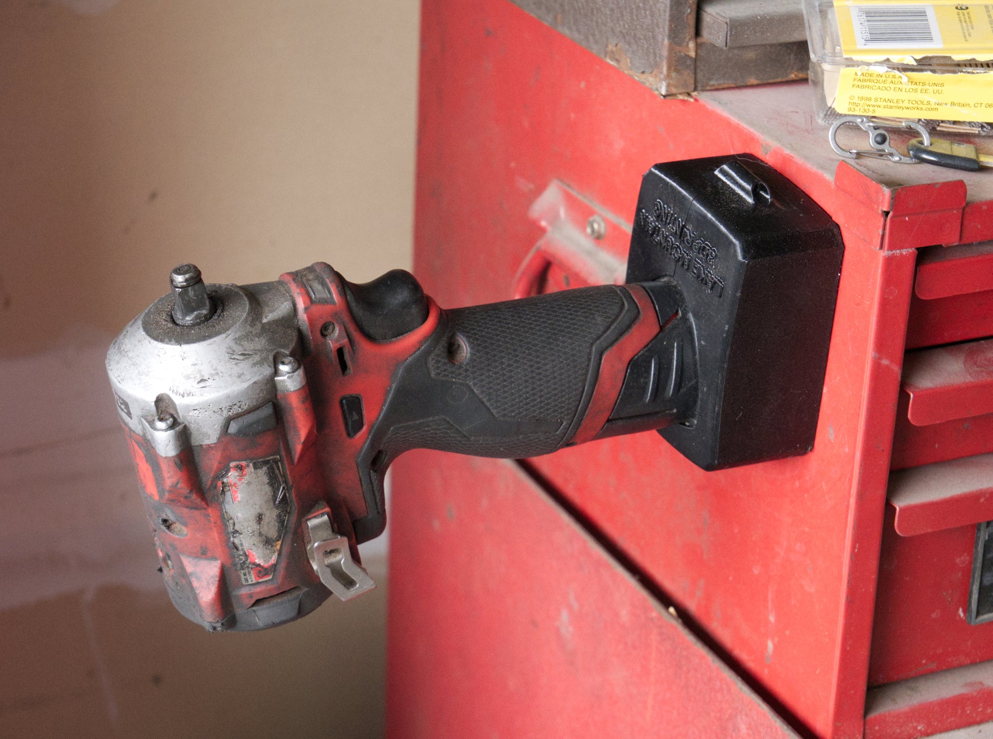 Milwaukee M12 Battery Case – M12 Magnetic Battery Boot for XC 3.0, XC 4.0, and XC 6.0 Batteries - on tool in use